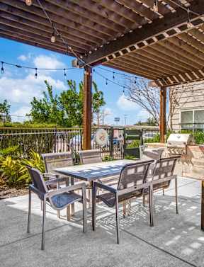 Outdoor patio with kitchen at Republic at Alamo Heights, San Antonio, Texas
