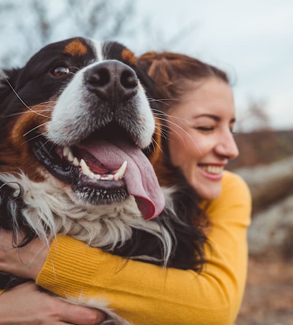 Young Woman With Dog at Converge KC Uptown, Kansas City Missouri