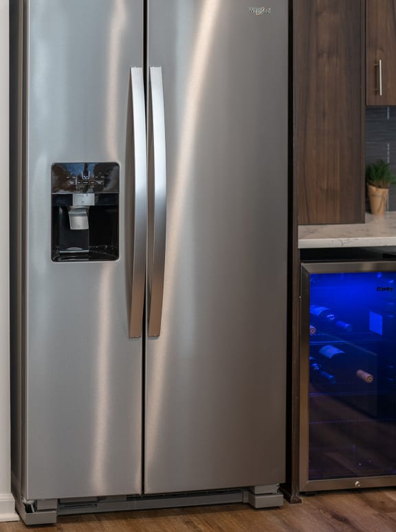 a stainless steel refrigerator and freezer in a kitchen  at The Clearing at ONE28, Kansas, 66062