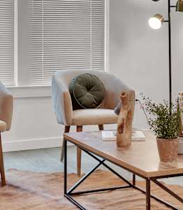 a living room with two couches and a coffee table