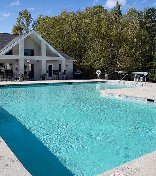 A swimming pool with a 5 ft marking on the side.