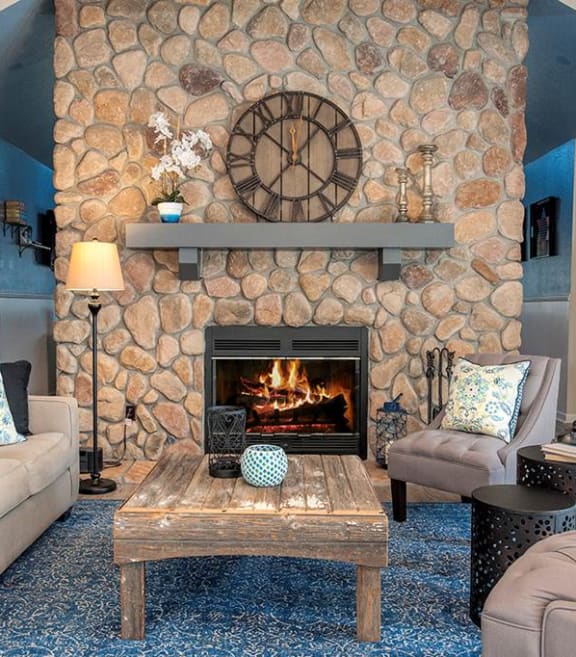 Rocklin Gold apartments clubhouse seating area and fireplace 