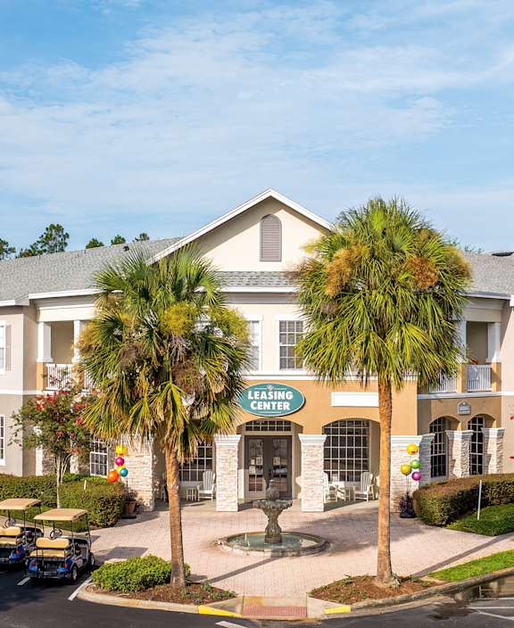 A street view of a building with a sign that reads "Cascade".