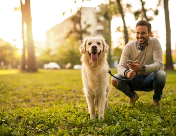 Man Smiling with Adorable Dog