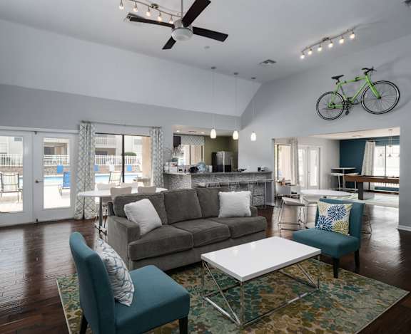 Clubhouse with sitting area at Stoneridge Apartments, Gainesville, Florida
