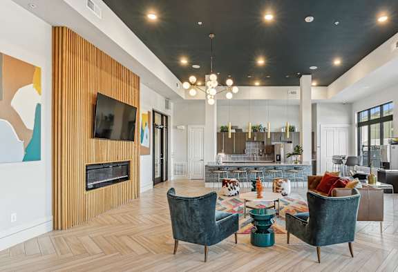 the preserve at ballantyne commons living room with furniture and a fireplace