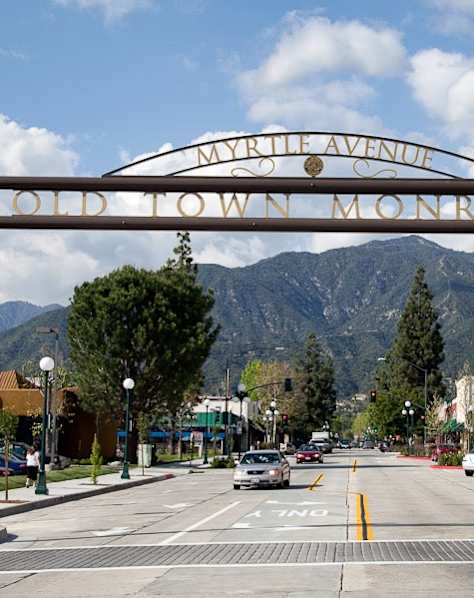 A street view of Old Town Monrovia with a sign that reads "Myrtle Avenue".