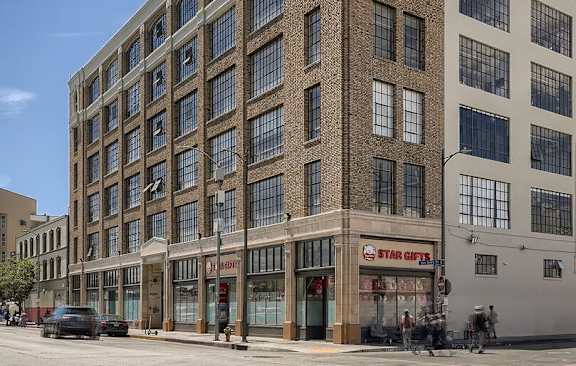 A large brick building with a Star Gifts store on the ground floor.