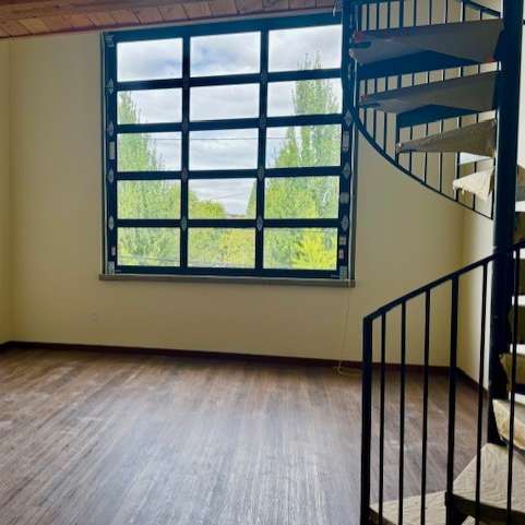 Room with a wooden floor at Atomic Orchard Experiment, Portland, OR