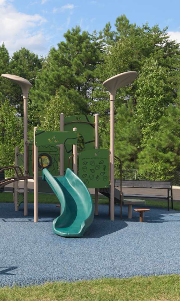 A playground with a slide, swings, and a bench.