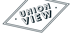 a sign that reads union view in the dark