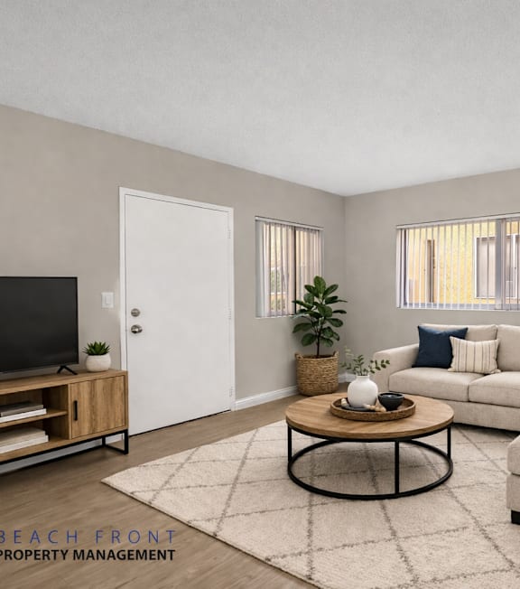 A well-lit, modern kitchen and living room with a dining area.
