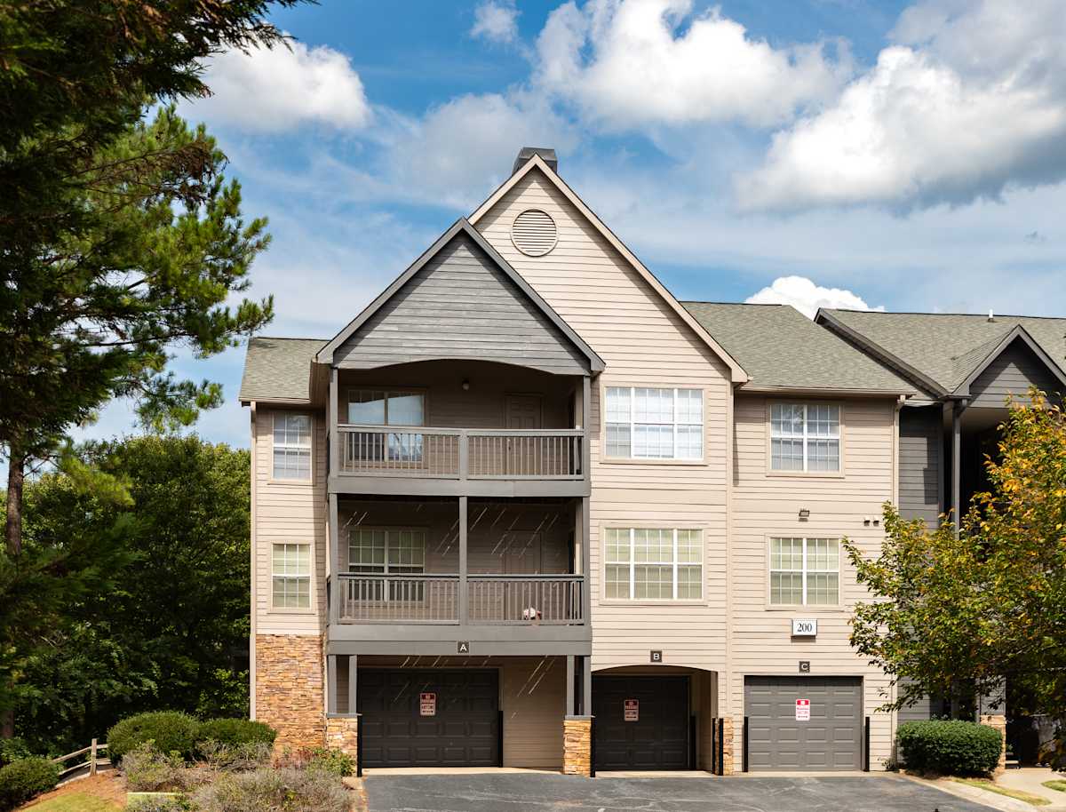 Wesley Hampstead Apartments at Douglasville garages exterior - Lithia Springs, GA