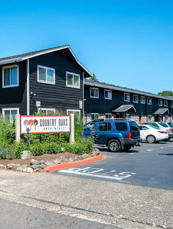 A black building with a sign that says "Country Bar".