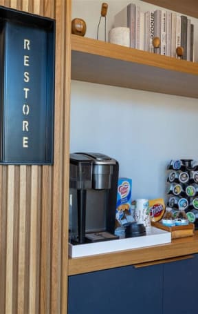 a coffee maker on a counter in a hotel room  at The Preston at Hillsdale, San Mateo, California