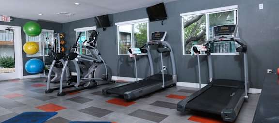 Fifteen 50 apartments near Las Vegas strip on site gym with treadmills, ellipticals, yoga mats, exercise balls, and dumbbell weights.