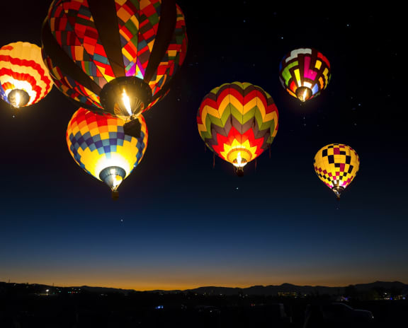 Beautiful View of Hot Air Balloons at Night