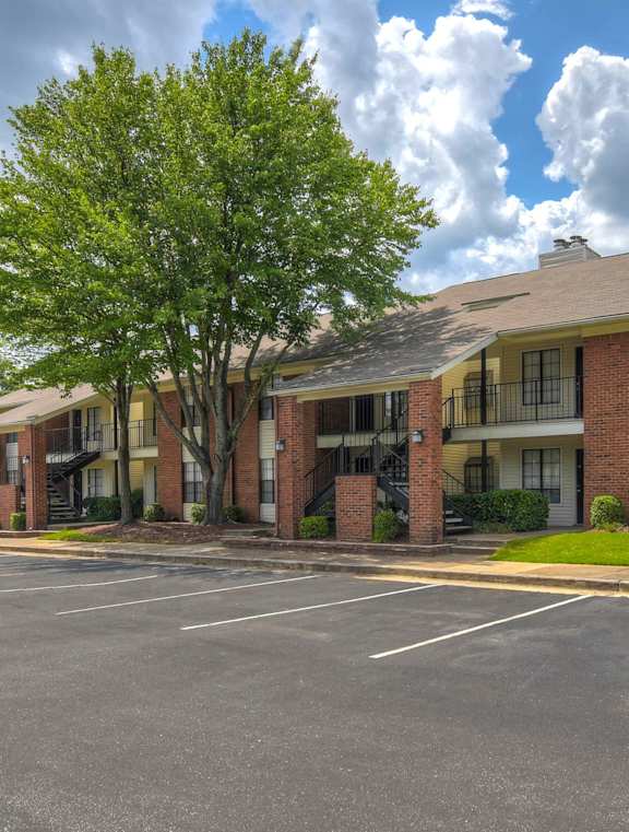 Building exterior with parking lot at Cordova Creek Apartments, Tennessee, 38016