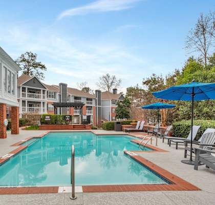 Pool with chairs and umbrellas at Madison Brookhaven, Georgia, 30329