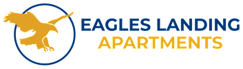 An image of a logo for Eagles Landing Apartments featuring a bird in flight.