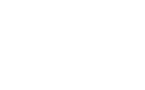 The image shows a logo for "The Desoto Apartments" with stylized text in white on a black background.