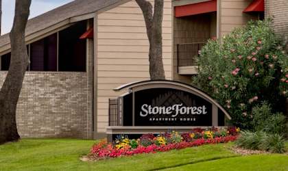 a large building with a sign in front of it