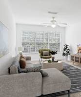 a bedroom with a bed and pillows