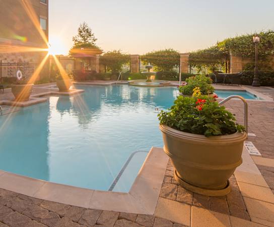 the swimming pool at our apartments at dusk