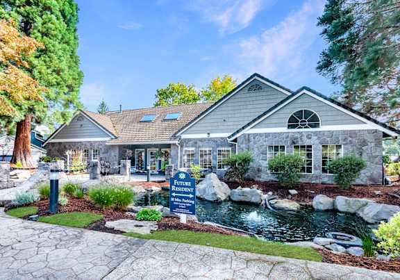 St. Mary's Woods front walkway with a fountain pond in Beaverton, Oregon