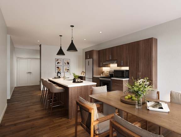 A modern kitchen with wooden floors and furniture at The Villages at Saugatuck, Westport, 06880