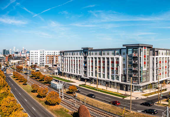 an aerial view of a large building on a city street at South and Hollis, North Carolina