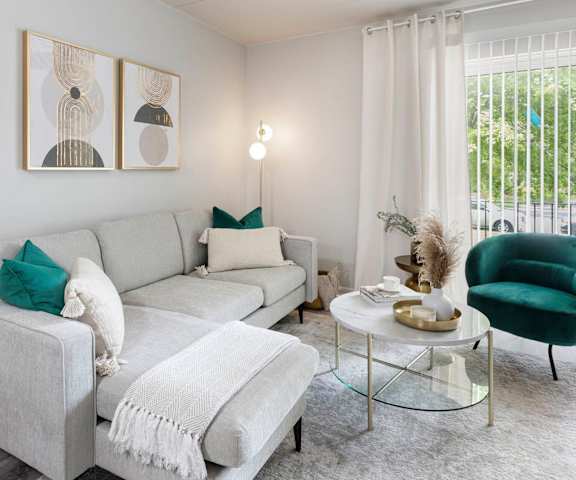 a living room with a couch and a table