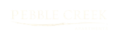 The image features the logo of Pebble Creek Apartments.