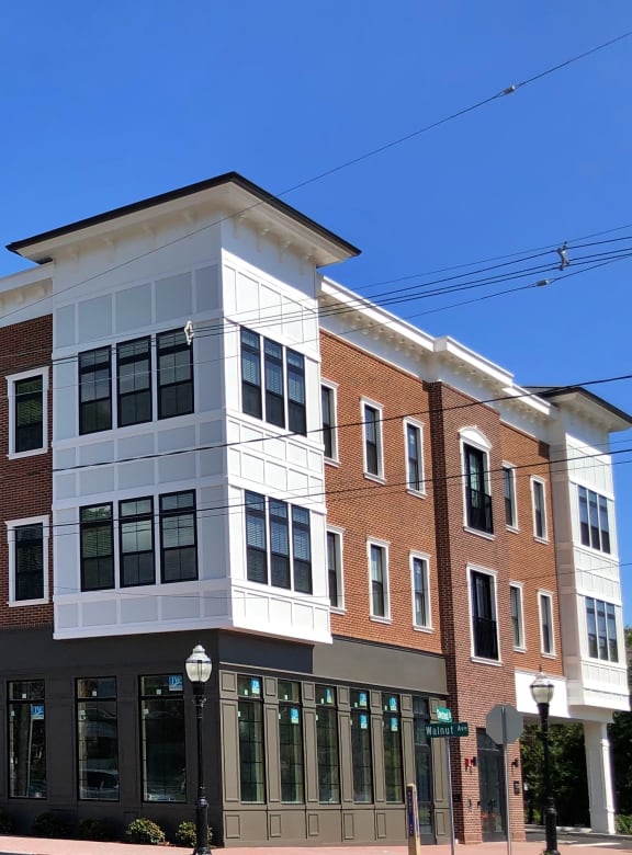 a new building on the corner of a city street