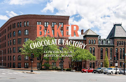 The Baker Chocolate Factory is located in Lower Mills, Boston, Massachusetts.