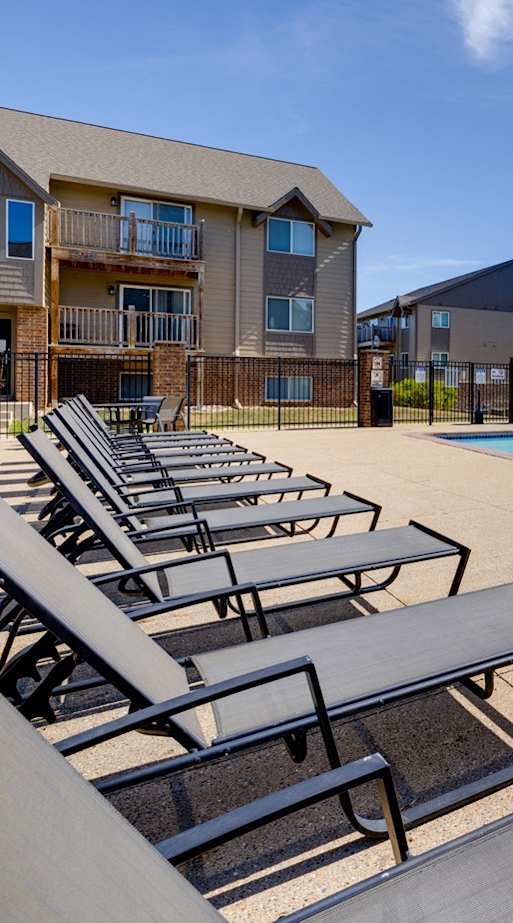 A sparkling pool with crystal-clear water beckons residents to enjoy a refreshing swim at the clubhouse.