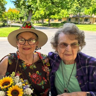 Three women wearing hats at River Commons Senior Living, Redding, CA, 96002