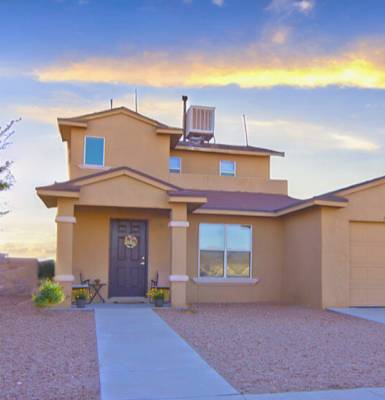A house with a driveway and a garage.
