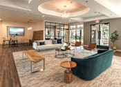 Thumbnail 17 of 49 - clubroom sitting area with couches at Monterey Ranch, Austin, TX