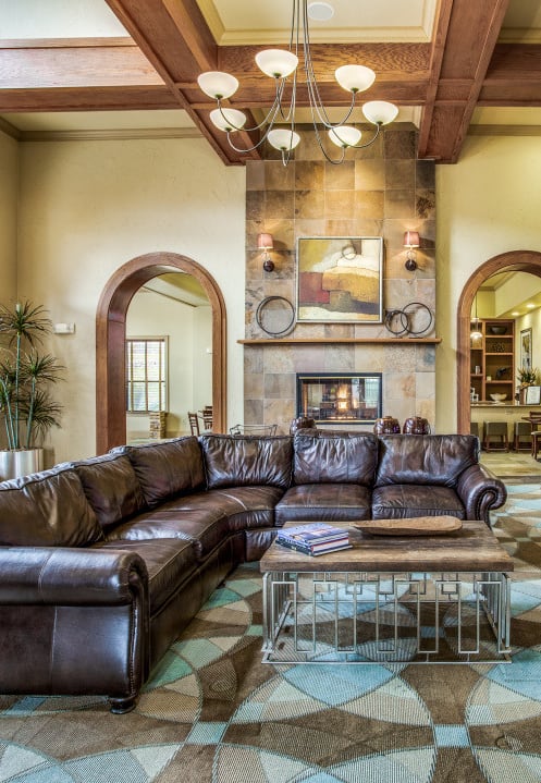 Hudson Miramont Apartments Clubhouse Seating Area with Fireplace and Television