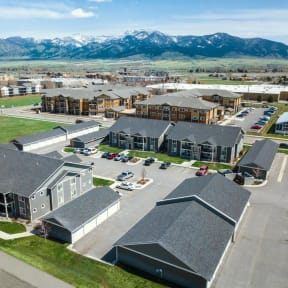 a city with mountains in the background at Madison Park, Bozeman, MT