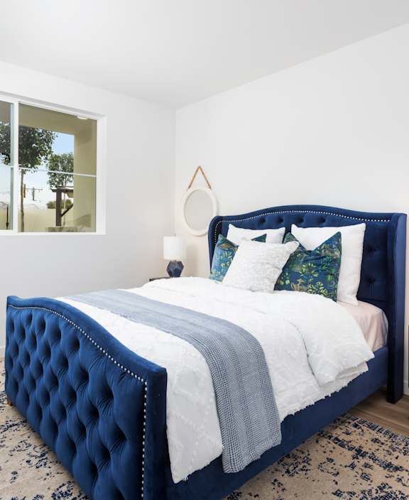 Ocean Edge at Laguna Beach modern kitchen with a bar stool and a couch.