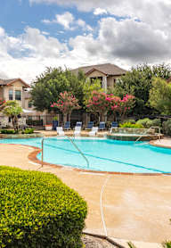 Property Exterior with Green Space at Park Hudson Place Apartments, Bryan, Texas