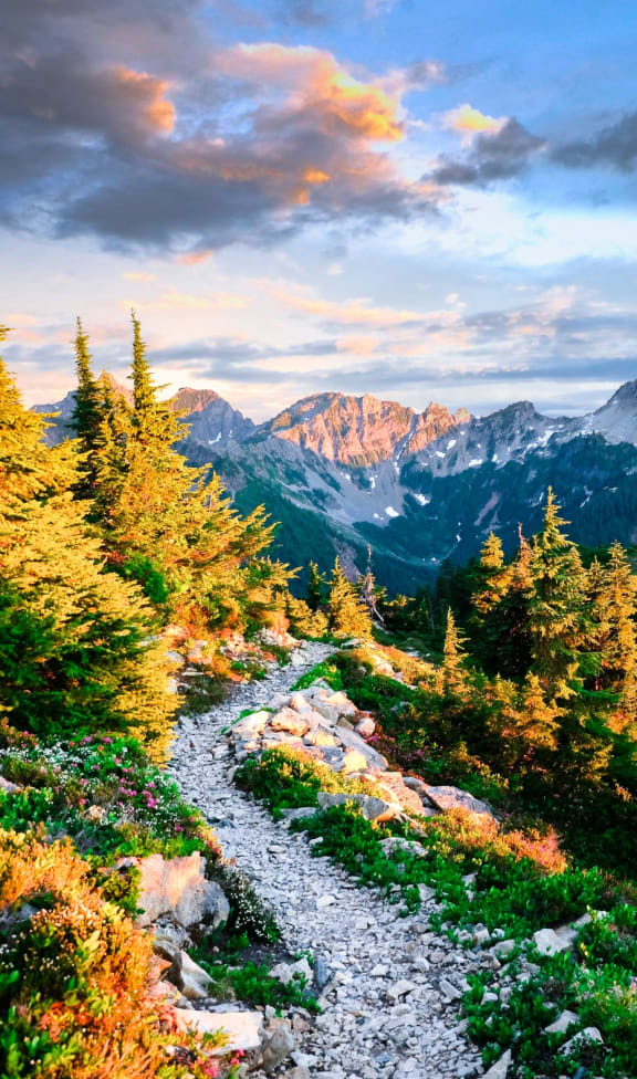 Sun Shining on Beautiful Mountains with Hiking Path