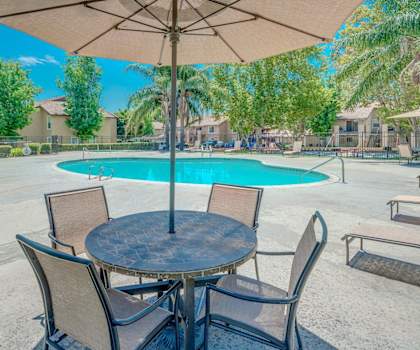 Seating and Table by Pool