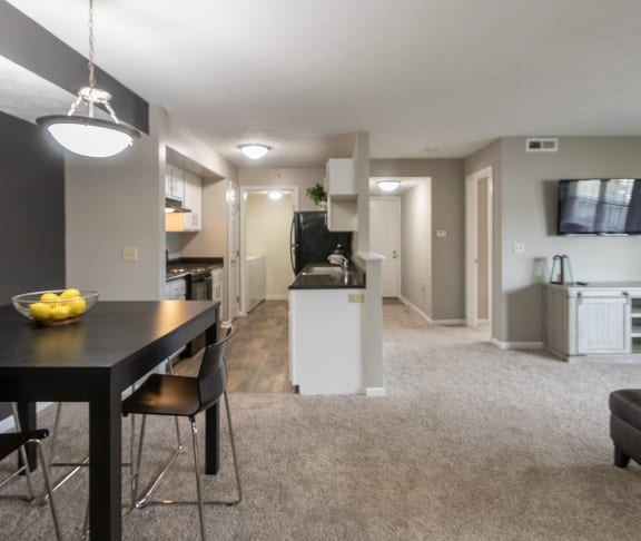 This is a photo of the kitchen of a 1245 square foot 2 bedroom apartment at Cambridge Court Apartments in Dallas, TX.