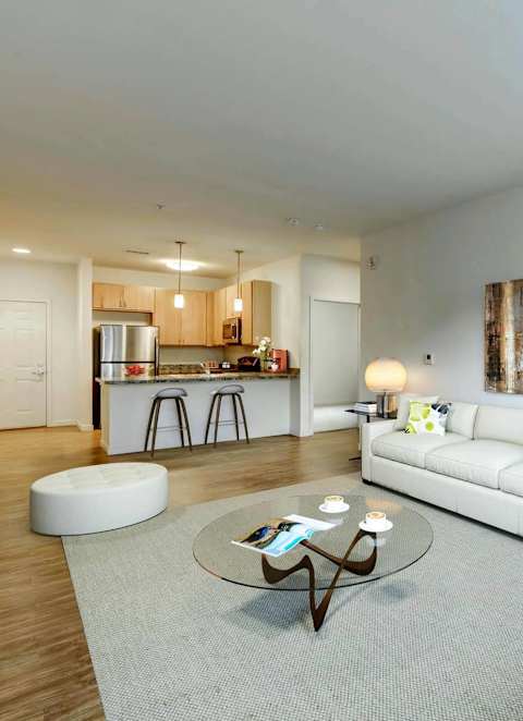 a living room with a couch and a table