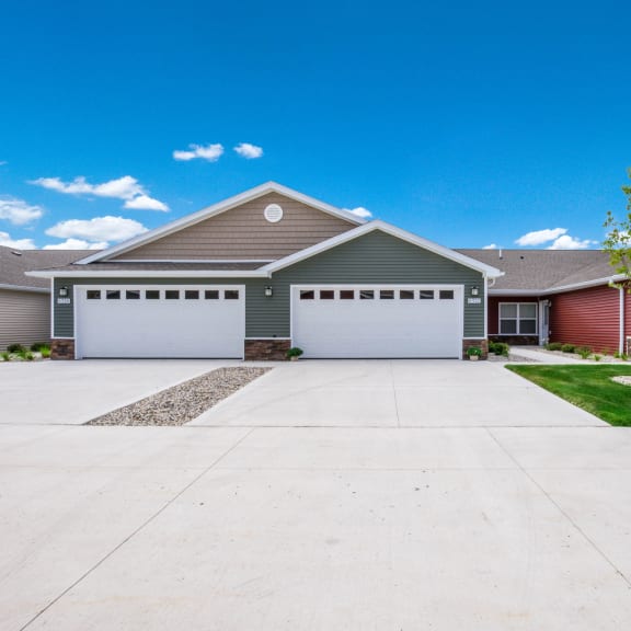 a house with a driveway in front of it
