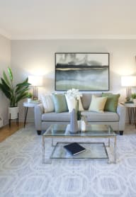 a living room with two couches and a coffee table