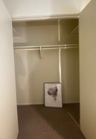 White desk in a room with a glass door at Bowles Apts, Azusa California